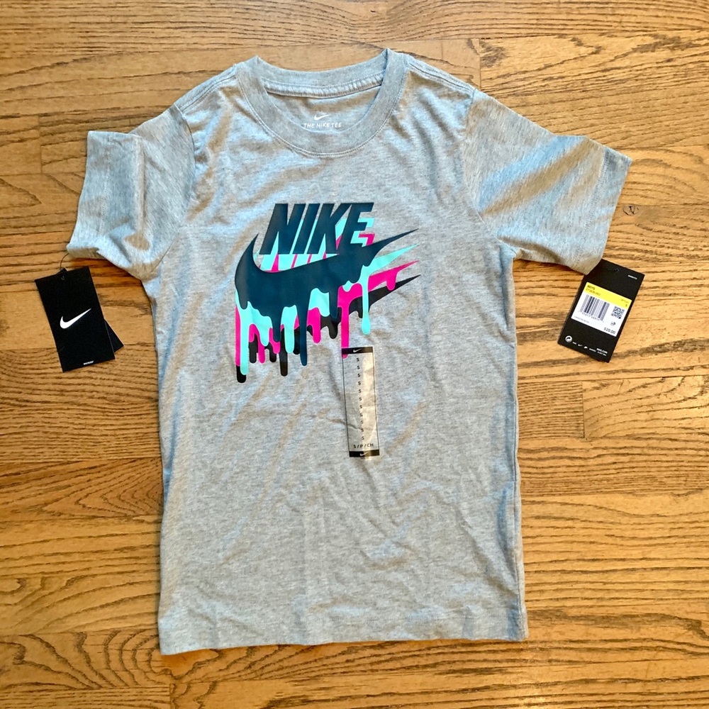 Brand new Nike boys t-shirt, size small.